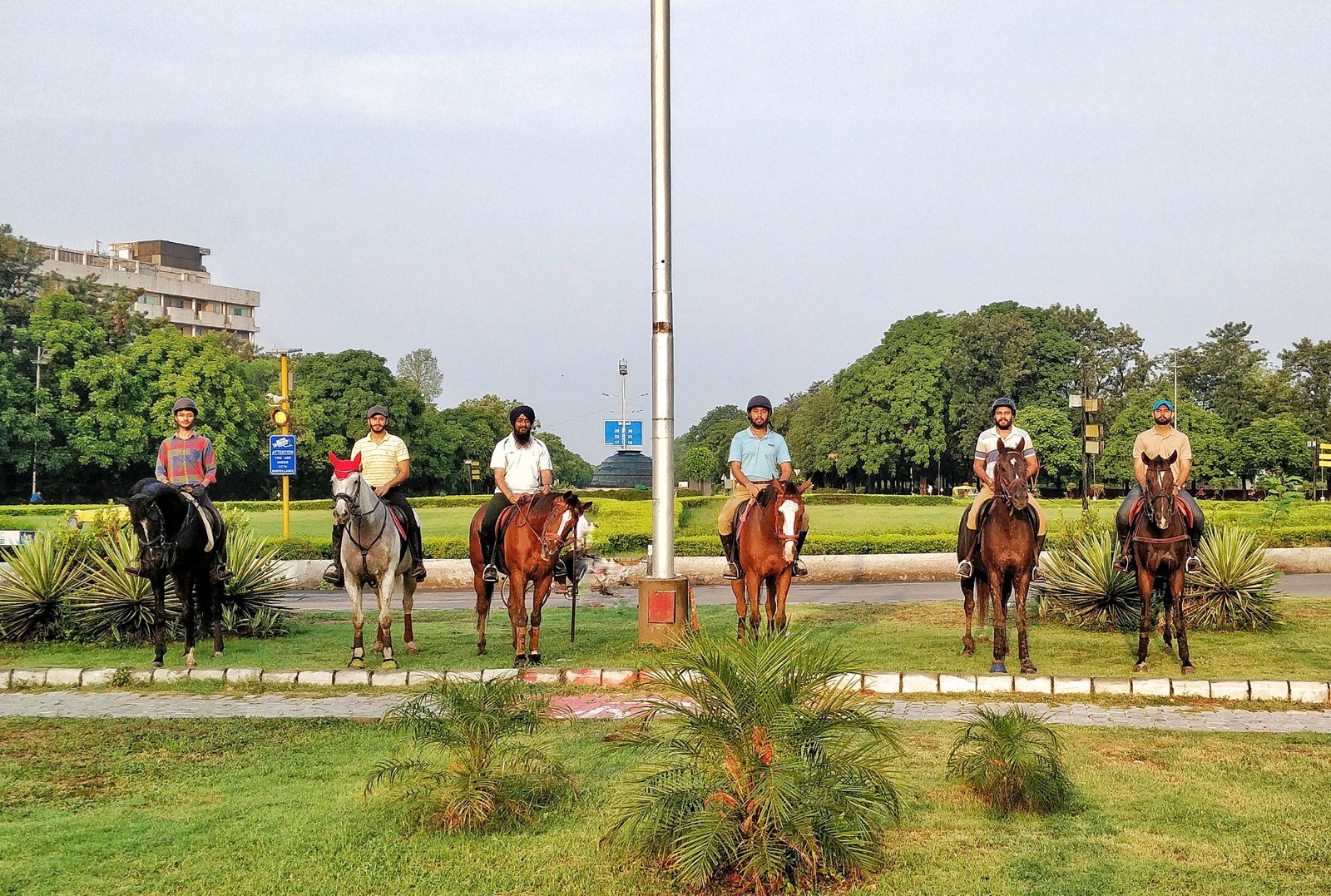 Riders from the estate at a Chandigarh roundabout